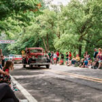 July 4 Festivals: Spectators line the streets of Alderson during the town's annual Fourth of July parade, one of West Virginia's longest-running Independence Day traditions.