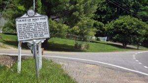 The W.Va. State Historical Marker for the Mike Fink Grave stands at the intersection of Milo Road one mile east of the Low Gap.