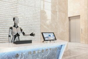 A robotic hotel clerk appears ready to help, though many travelers still prefer a real person when reservations go awry or special requests arise. WVU research suggests the future of hospitality will blend artificial intelligence with human service. (Getty Image)