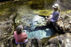 Visitors relax in the public springs at Berkeley Springs State Park. (Photo: W.Va. Tourism)