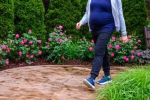 WVU Department of Epidemiology and Biostatistics, Ally Kennedy posed for study on pregnancy and sedentary behavior the on Thursday, May 21, 2026 at the garden outside of the Cancer Institute, in Morgantown, WV (WVU Photo/Davidson Chan)