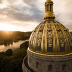 The gold dome of the West Virginia State Capitol rises above Charleston. West Virginia celebrates its 163rd birthday on June 20, commemorating its admission to the Union in 1863 during the Civil War.
