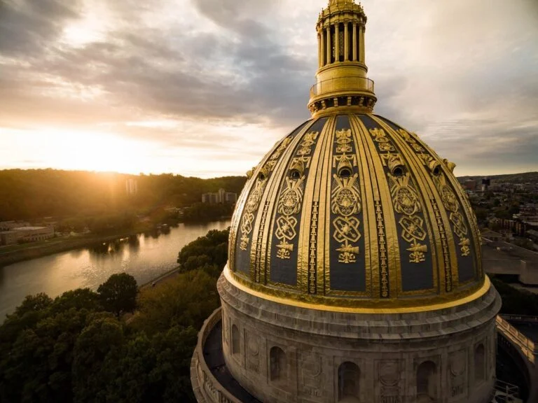 The gold dome of the West Virginia State Capitol rises above Charleston. West Virginia celebrates its 163rd birthday on June 20, commemorating its admission to the Union in 1863 during the Civil War.