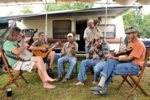 String band musicians perform together during the Appalachian String Band Music Festival at Camp Washington-Carver in Fayette County. The annual gathering draws thousands of musicians and music lovers from across the United States and more than 20 countries to celebrate one of America's oldest musical traditions.