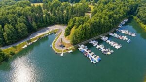 Boats line the marina at Lake Stephens, where fishing, paddling, swimming, and lakeside recreation are helping diversify Raleigh County's growing outdoor tourism economy.