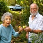 Edna Moreland and Brother Ginevan display freshly gathered pawpaws near Paw Paw, West Virginia. The state's annual Pawpaw Festival celebrates the unique native fruit and the Appalachian traditions surrounding its harvest.