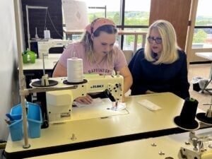 U.S. Rep. Carol Miller tours the PATTERN textile innovation facility in Beckley, where entrepreneurs and manufacturers are developing outdoor apparel and sewn products as part of a regional effort to expand the New River Gorge economy.