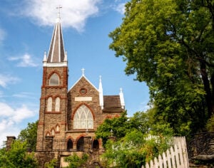 The spire of St. Peter's Roman Catholic Church rise above the historic streets of Harpers Ferry. Dedicated in 1833, the landmark church has long welcomed pilgrims, travelers, and local worshippers at the confluence of the Potomac and Shenandoah rivers.