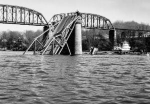 The collapsed Silver Bridge lies submerged in the Ohio River after its catastrophic failure on Dec. 15, 1967. Although not the deadliest disaster in West Virginia history, the collapse claimed 46 lives and transformed bridge inspection standards across the United States.