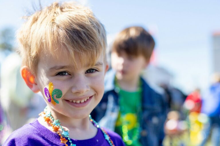 A smiling child with colorful face paint enjoys a day at the State Fair of West Virginia. Fair officials and community partners are providing complimentary all-day midway ride passes to eligible foster children during this year's event, helping more young people experience one of the state's most cherished summer traditions. (Photo courtesy Jeremiah Lawrence)