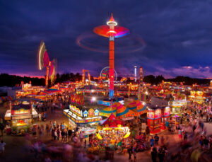 The State Fair of West Virginia draws thousands of visitors each August to Lewisburg, where competitive exhibits, livestock shows and carnival attractions highlight the state's largest annual celebration of agriculture. (Photo courtesy Greenbrier Valley Convention and Visitors Bureau)