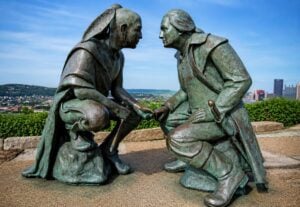 A statue of George Washington and Seneca leader Guyasuta overlooks the confluence of the Allegheny and Monongahela rivers at Pittsburgh's Mount Washington. While the monument commemorates their historic friendship, some historians and local residents have wondered why a similar memorial does not stand near Ravenswood, W.Va., where the two men are believed to have camped during Washington's 1770 expedition.