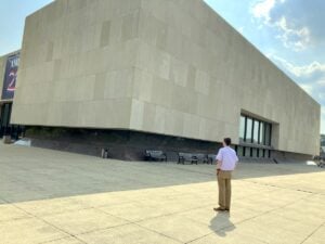 Historian and West Virginia Explorer correspondent Cody Straley stands before the West Virginia Culture Center in Charleston, whose clean lines and imposing Brutalist design have made it one of the state's most recognizable public buildings since opening in 1976.