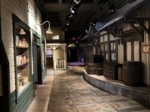 A recreated small-town streetscape inside the West Virginia State Museum at the Culture Center immerses visitors in everyday life from the Mountain State's past. The museum's walk-through exhibits have introduced generations of residents and travelers to West Virginia history since 1976.