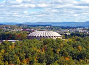 The WVU Coliseum, designed by Charleston architectural firm C. E. Silling and Associates, is among West Virginia's best-known examples of Brutalist architecture. The firm later designed the West Virginia Culture Center, which opened in Charleston in 1976.