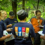 An instructor guides educators through the Lower New River Gorge, where whitewater rafting offers hands-on lessons in geology, hydrology and teamwork. (Courtesy of ACE Adventure Resort)
