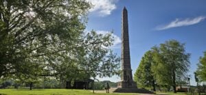 The Battle Monument rises at Tu-Endie-Wei State Park in Point Pleasant, W.Va., where the Water Panther Stone is preserved near the confluence of the Kanawha and Ohio rivers. The monument commemorates the 1774 Battle of Point Pleasant.