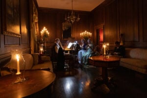Period-costumed musicians perform by candlelight inside Blennerhassett Mansion during Mansion by Candlelight at Blennerhassett Island Historical State Park. (Photo courtesy Greater Parkersburg CVB)