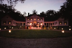 Lanterns and candlelight illuminate Blennerhassett Mansion as visitors gather during Mansion by Candlelight at Blennerhassett Island Historical State Park. (Photo courtesy Greater Parkersburg CVB)