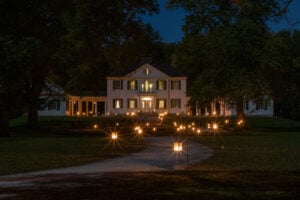 Lanterns illuminate the grounds of Blennerhassett Mansion during Mansion by Candlelight at Blennerhassett Island Historical State Park. The two-night event returns Oct. 9–10, 2026. (Photo courtesy Greater Parkersburg CVB)