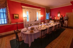 A candlelit dining table evokes the elaborate gatherings once hosted by Harman and Margaret Blennerhassett at their Ohio River island estate. Mansion by Candlelight returns Oct. 9–10, 2026. (Photo courtesy Greater Parkersburg CVB)