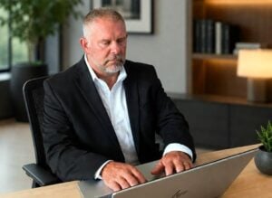 David Chinn, chief operations officer of All-West Virginia MLS, works at his computer. (Photo courtesy David Chinn)
