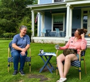 Emma Crow-Willard visits with Marsha Waybright of the Laurel River Club Bed & Breakfast in Bowden during her month-long hike of West Virginia's Allegheny Trail. Crow-Willard is interviewing residents and business owners along the route as part of her Allegheny Trail Economies Expedition.