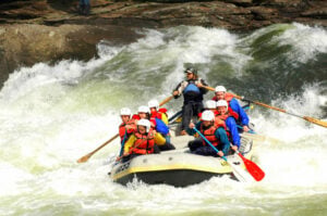 Rafters charge through whitewater on the Gauley River during Gauley Season in West Virginia. The six-week fall season draws thousands of whitewater enthusiasts to the river each year. (NPS photo)