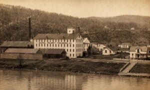 The Gospel Trumpet Publishing Company operated in Moundsville, W.Va., from 1898 to 1906, when the Ohio River city became an important publishing and missionary center for the Church of God. (Historic image, colorized)