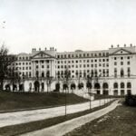 The Greenbrier rises above the grounds at White Sulphur Springs, W.Va., in this historic photograph. The resort traces its origins to 1778 and has played roles in American history ranging from the Civil War to World War II and the Cold War. (Courtesy West Virginia & Regional History Center, WVU Libraries)