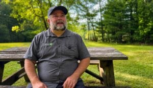 Mike Powell, director of land management and stewardship for The Nature Conservancy in West Virginia, oversees the organization's nature preserves, leads ecological restoration projects such as red spruce replanting, and guides public field trips across the Mountain State.