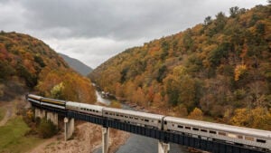 The Potomac Eagle Scenic Railroad travels through brilliant fall foliage in West Virginia's Potomac Highlands, where mountain elevations can produce some of the state's earliest autumn color.