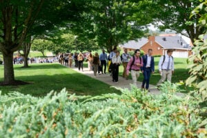 First-year students in the West Virginia School of Osteopathic Medicine's Class of 2030 walk to orientation in Lewisburg. The incoming class includes a record 79 West Virginia residents as the medical school expands programs designed to train more physicians for the state.