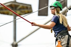 Gretchen Nichols looks out over the climbing area at The Peak at the Nemacolin Resort.