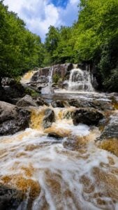 A cascading mountain stream crosses the Allegheny Trail as it winds through some of West Virginia's most remote forests. Filmmaker Emma Crow-Willard said the trail's changing landscapes were among the biggest surprises of her 320-mile journey.