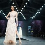 A model walks the runway during a fashion show. A West Virginia University researcher says the rise of weight-loss medications is coinciding with a retreat from size inclusivity in the fashion industry. (Photo by Yogendra Singh/Unsplash)