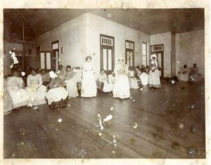Women patients and caregivers are pictured at the West Virginia Hospital for the Insane in Weston circa 1896–1900, during the period surrounding the 1899 investigation of Superintendent W.E. Stathers. The photograph is preserved in the papers of Dr. Lorilla F. Bullard, a physician at the hospital who testified during the investigation. (West Virginia and Regional History Center, WVU Libraries)