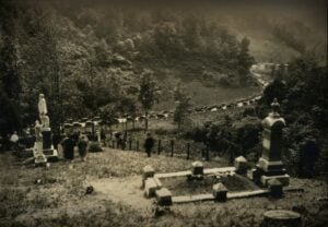 Mourners gather for the 1929 funeral of Levicy Chafin Hatfield in Logan County, West Virginia. Funerals were once deeply communal events in the Mountain State, with relatives and neighbors assuming many of the duties later performed by funeral homes. (West Virginia & Regional History Center, WVU Libraries)