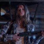 June Schreiner stars in Dark Hollow, an Appalachian horror film written and directed by West Virginia-raised filmmaker Daniel Byers. Byers said his father trained Schreiner to handle the pump-action shotgun used in the film. (Courtesy Brainstorm Media)