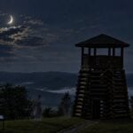Civil War soldiers are depicted as apparitions near the observation tower at Droop Mountain Battlefield State Park, where stories of soldiers, cannon fire and other unexplained encounters have circulated for generations. The Pocahontas County battlefield has been added to the West Virginia Paranormal Trail for 2026. (WVExplorer illustration)
