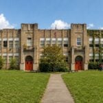 The former Fort Gay High School in Fort Gay, W.Va., closed in 2013 and is now being redeveloped with eight affordable apartments and space for community, municipal and commercial uses.