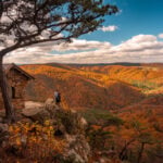 Fall foliage spreads across the mountains at Lost River State Park in Hardy County, West Virginia. Elevation, slope, moisture and forest type can cause autumn color to develop differently across the state's mountainous landscape.