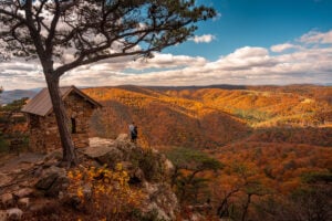 Fall foliage spreads across the mountains at Lost River State Park in Hardy County, West Virginia. Elevation, slope, moisture and forest type can cause autumn color to develop differently across the state's mountainous landscape.