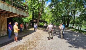 State preservation leaders meet with National Park Service officials during a 2024 tour of historic properties at Thurmond. Preservation advocates said afterward that some of the buildings they inspected appeared to be in better condition than they had expected based on Park Service descriptions.