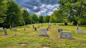 The Clarkson Prince Cemetery near Beaver in Raleigh County, West Virginia, contains the graves of Prince and other early families of the area. Like many nineteenth-century burial grounds, the cemetery was historically shaded by trees, which suppressed grass and reduced the need for mowing before modern lawn maintenance became customary.