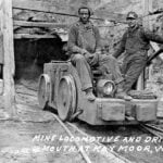 Coal miners pose with a mine locomotive at the drift mouth at Kaymoor in the New River Gorge. Coal companies established and named hundreds of mining communities across West Virginia during the industry's expansion. National Park Service photo.