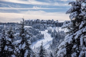 Snow covers the slopes and mountaintop village at Snowshoe Mountain in Pocahontas County, West Virginia. The resort is targeting Nov. 25 for the opening of its 2026–27 ski season.
