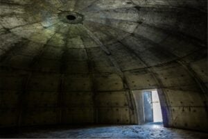 The concrete interior of a former TNT storage bunker at the West Virginia Ordnance Works near Point Pleasant, W.Va. The reinforced structure is among the surviving remnants of the World War II explosives facility. (Photo by Jesse Thornton)