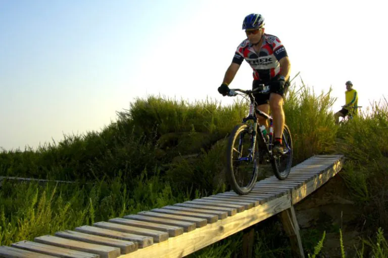 A cyclist crosses at bridge at Mountwood Park near Parkersburg, West Virginia.