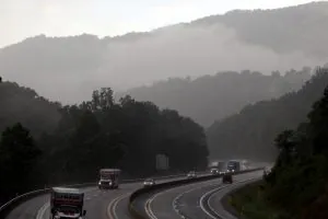 Vision impairment: Motorists navigate the West Virginia Turnpike in Fayette County during a summer downpour.